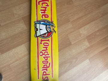 Selling with online payment: vintage Acme Longboard featuring their classic yellow graphic 
