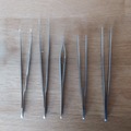 Gebruikte apparatuur: Chirurgische pincetten, 5 stuks