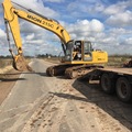 En alquiler: Retro excavadora con orugas 